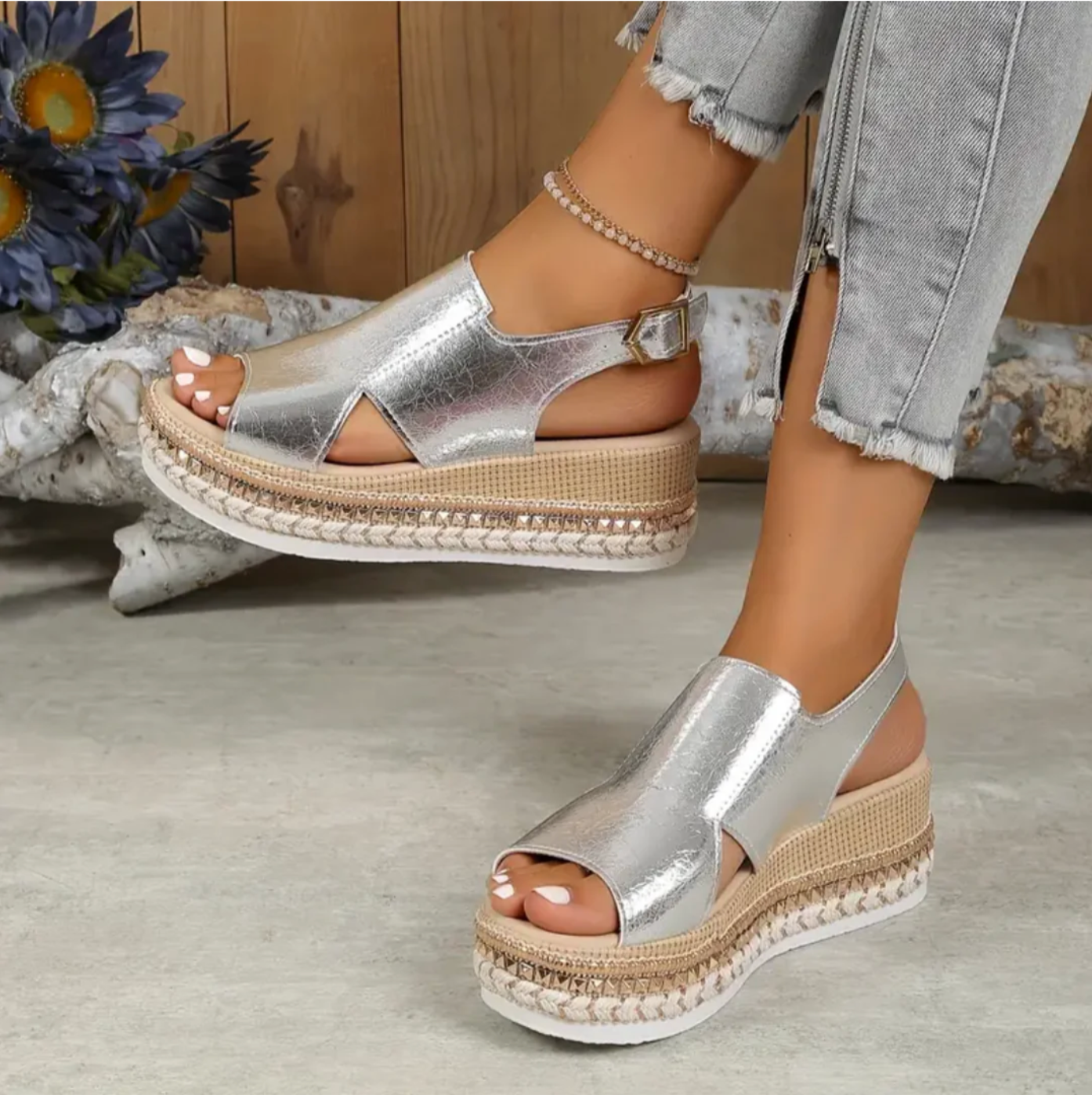 Silver metallic platform sandals with peep toe and adjustable ankle strap