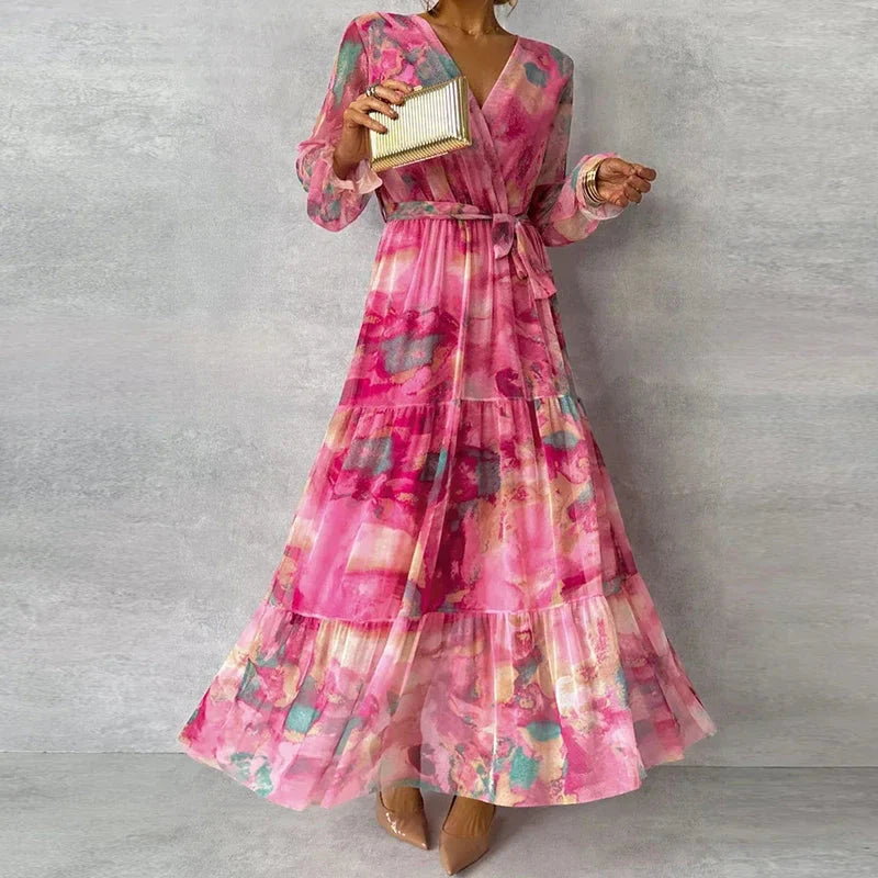 Full length pink floral v-neck maxi dress with puffed sleeves and ruffled layers