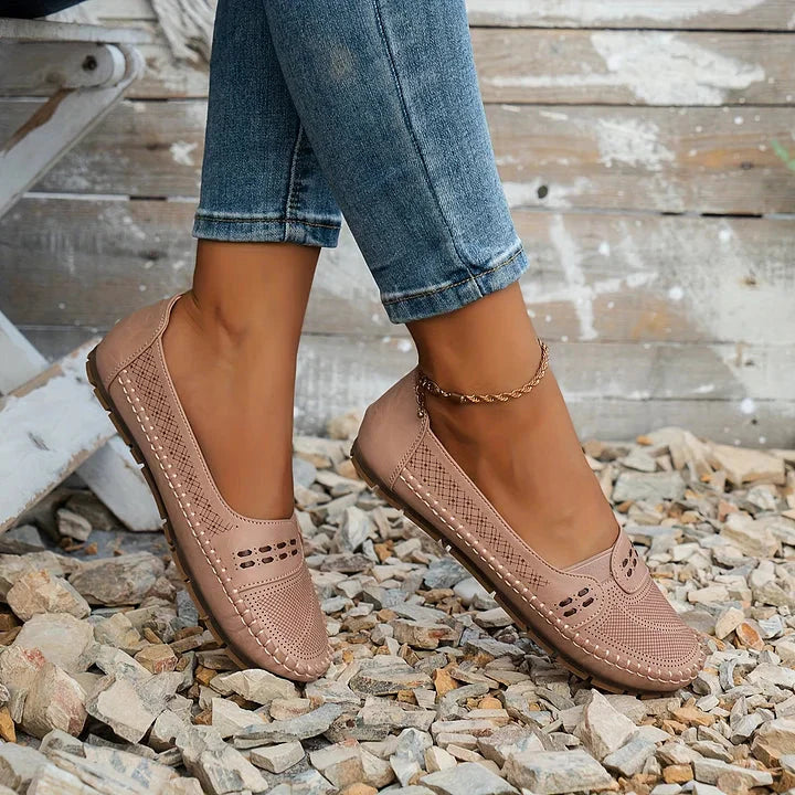 Taupe loafer flat with mesh texture and decorative stitching on vamp