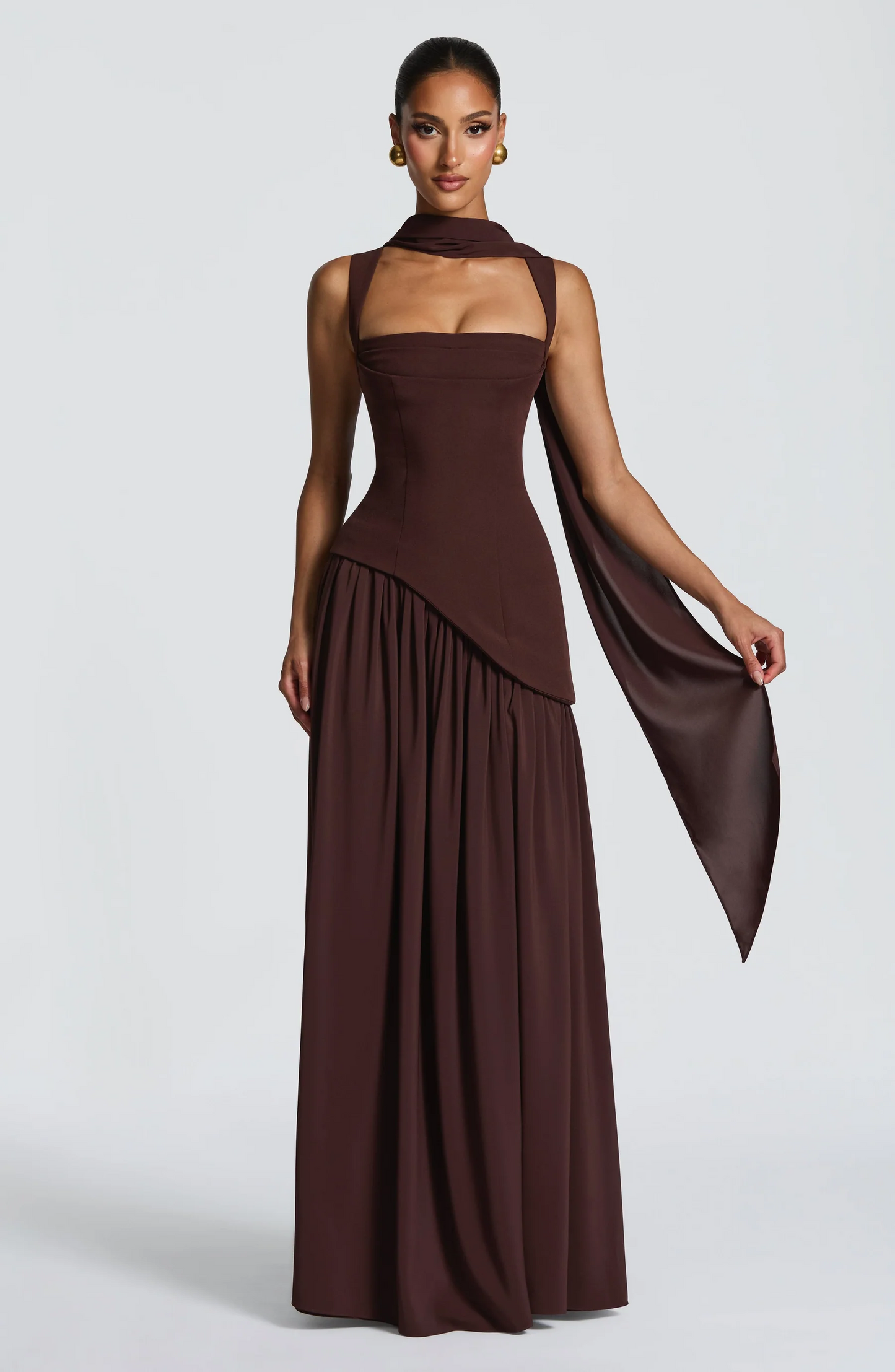 Burgundy maxi dress with draped sleeve and lace-up back closure