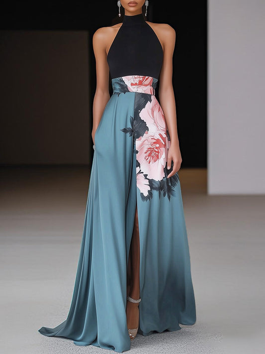 Halter maxi dress with black top, floral print waist band, and teal side slit skirt