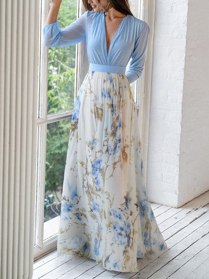 Back view of blue long sleeve maxi dress with cream floral botanical print