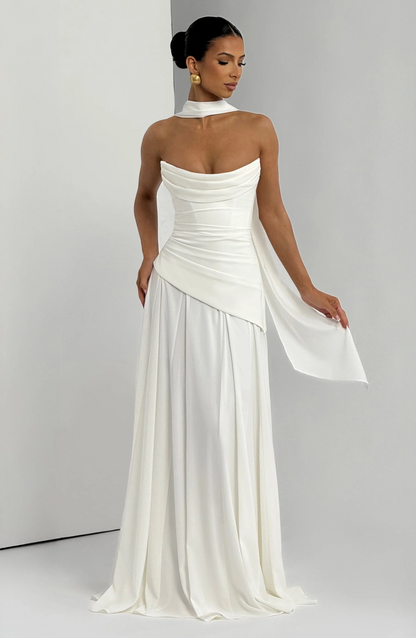 Ivory strapless cowl neck maxi dress with draped bodice and flowing skirt back view