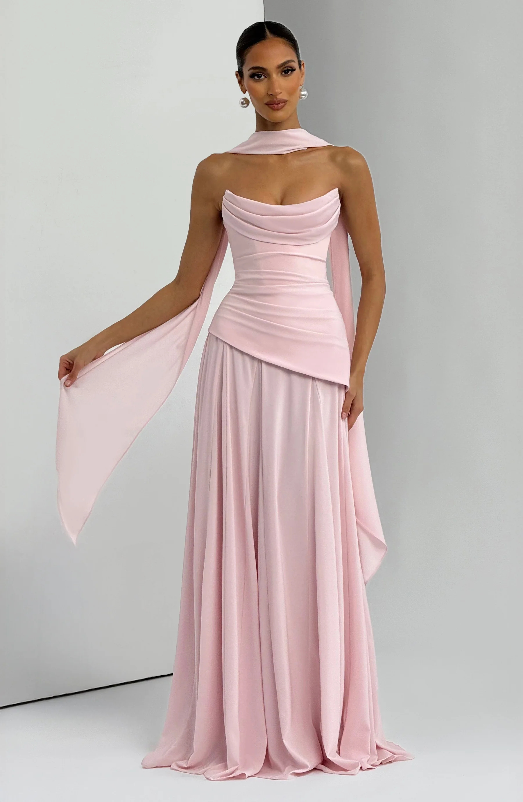 Blush pink strapless cowl neck maxi dress with draped bodice and side drape detail