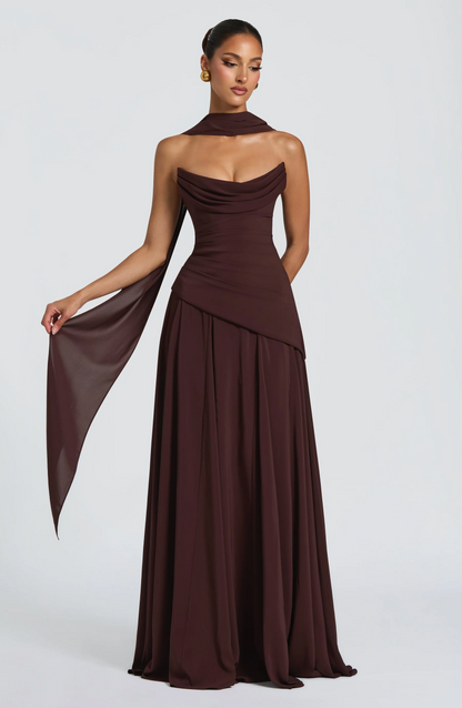 Burgundy strapless cowl neck maxi dress with draped bodice and flowing skirt front