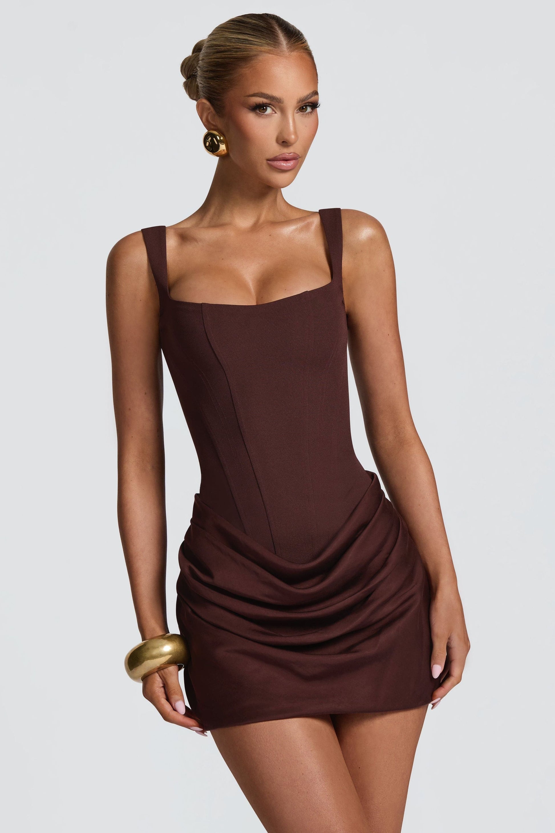 Close-up front view of brown square neck sleeveless mini dress