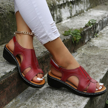 Burgundy red orthopedic sandals with open toe design and adjustable strap