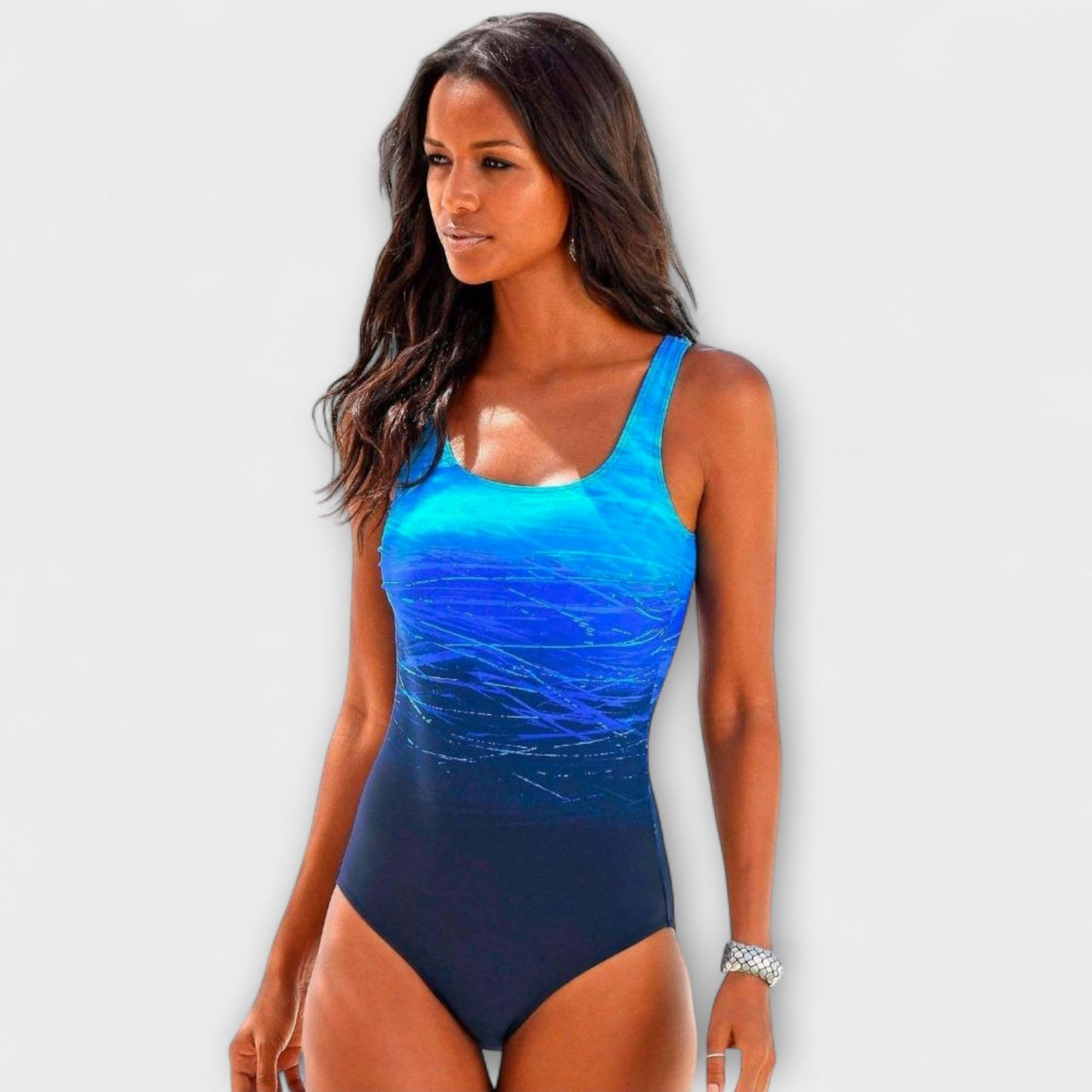 Blue gradient one-piece swimsuit with textured print, cyan to navy ombre