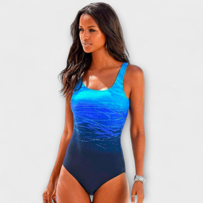 Blue gradient one-piece swimsuit with textured print, cyan to navy ombre