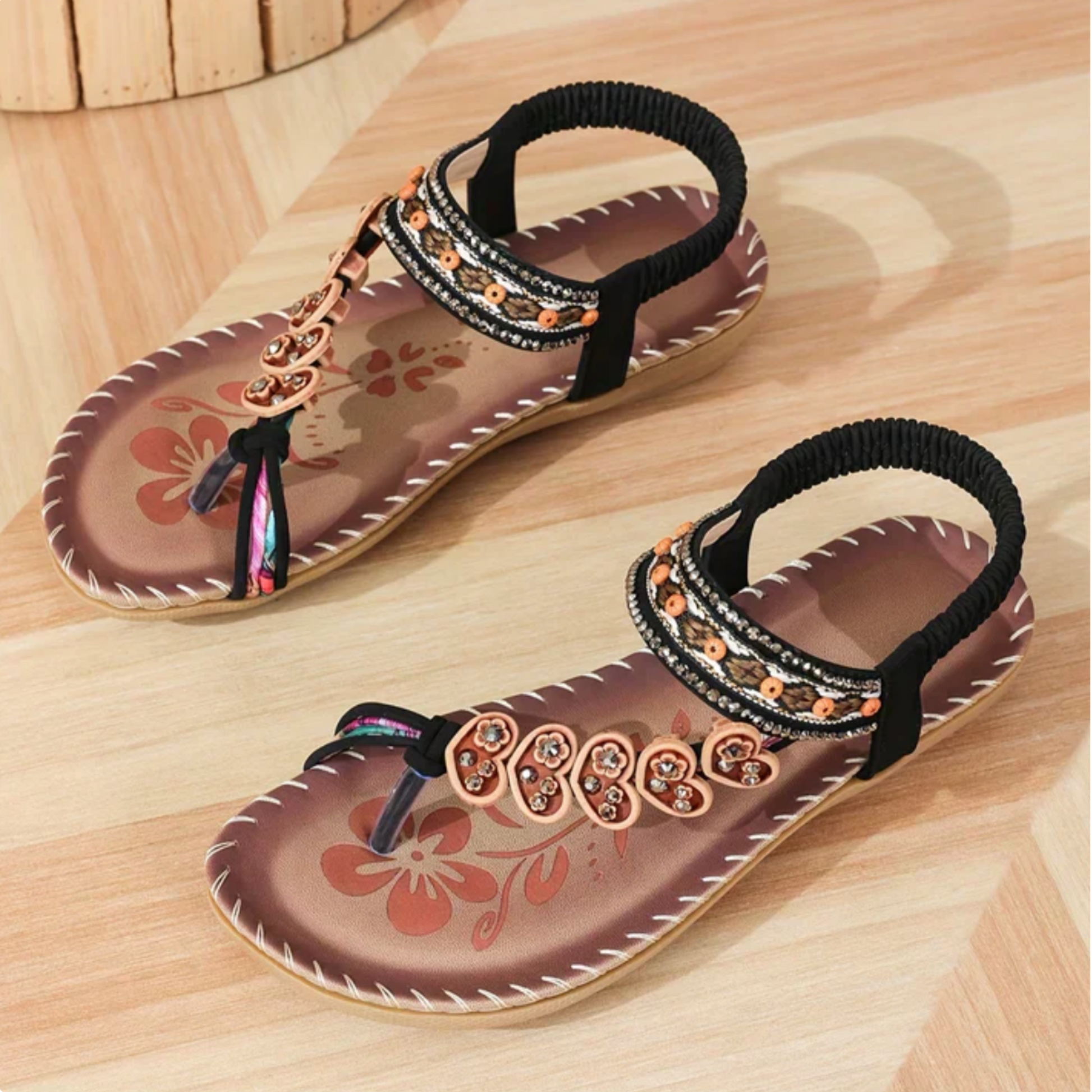 Mauve brown beaded t-strap sandals with ornate charms and rhinestone ankle band straps
