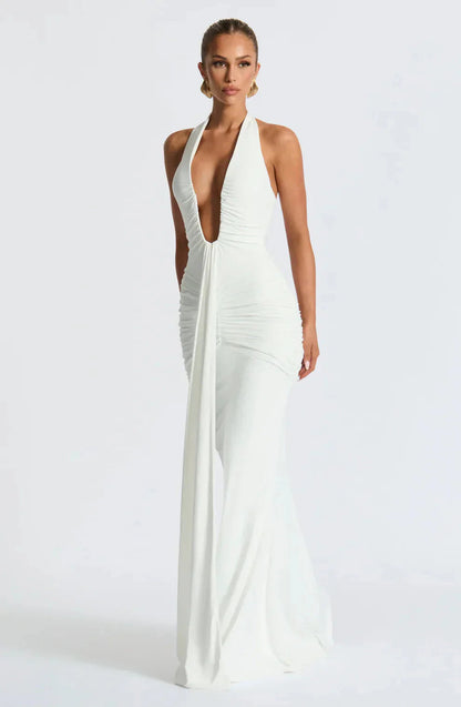 Ivory halter maxi dress with ruched bodice and flowing skirt