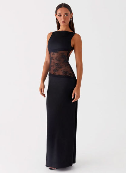 Black sleeveless maxi dress with sheer lace waist panel, side view