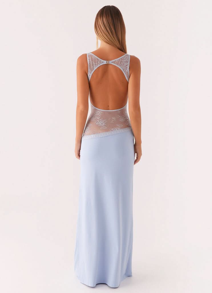 Light blue maxi dress with open back and lace cutout, rear view