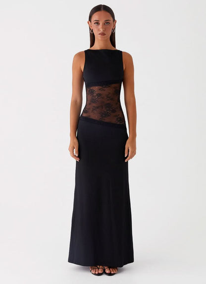 Black sleeveless maxi dress with lace cutout at waist, front view