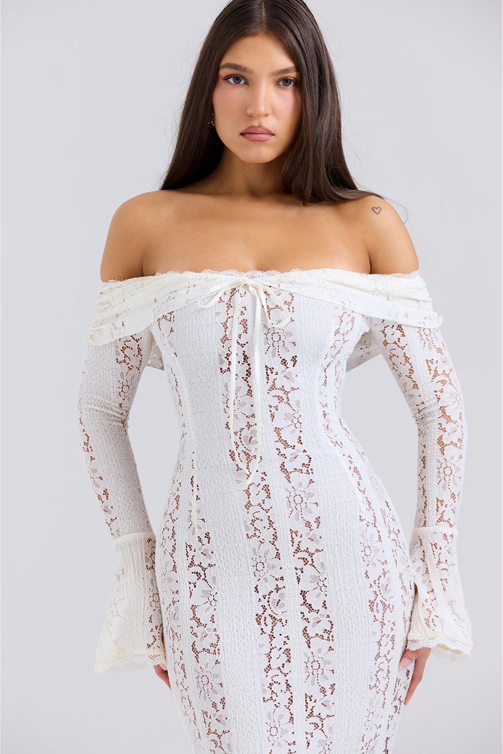 White lace off-shoulder maxi dress with long sleeves and draped neckline