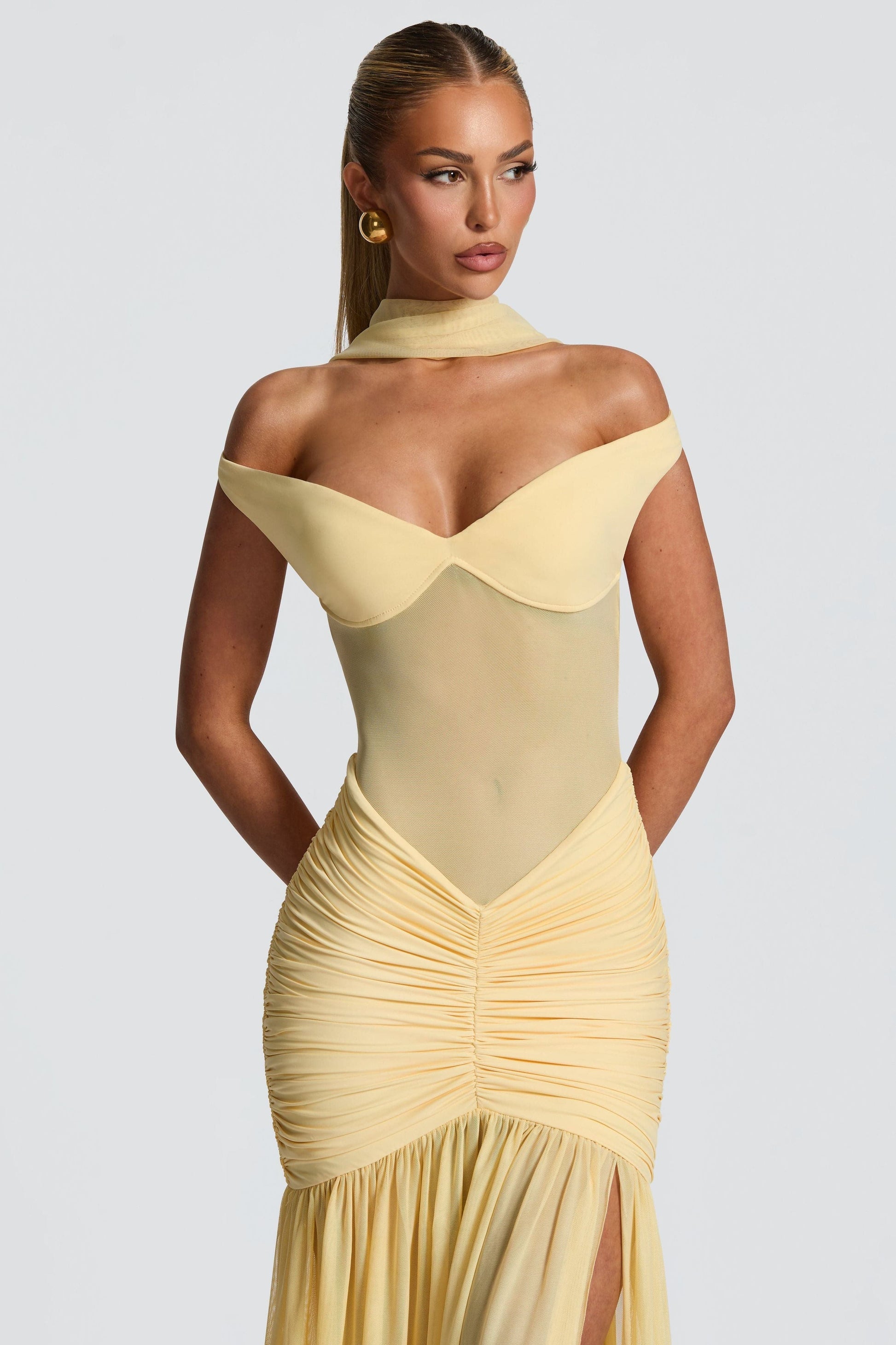 Cream off-shoulder ruched maxi dress close-up detail