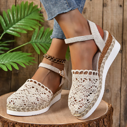 Front view of cream and caramel crochet lace ankle strap sandals with metallic chain detail