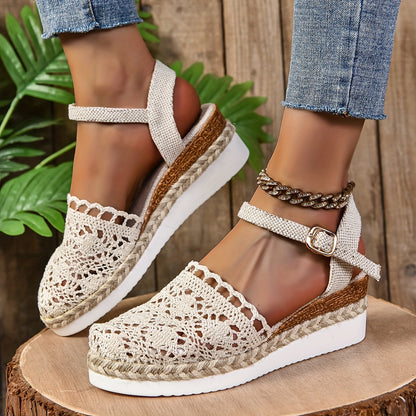 Cream and caramel crochet lace sandals with adjustable ankle straps, worn together