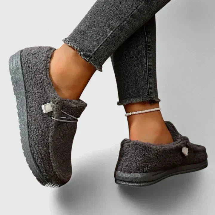Charcoal gray fleece moccasin loafers with plush wool interior and grip sole