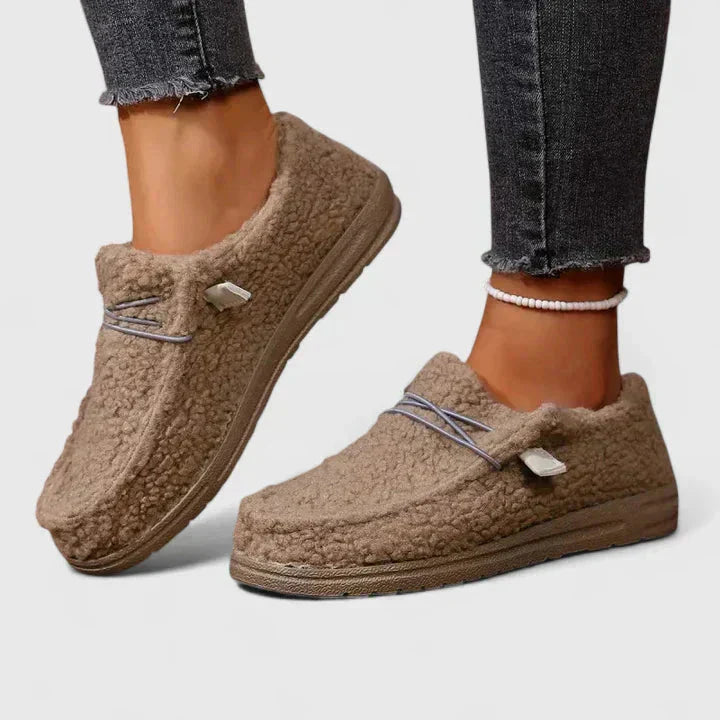 Beige fleece moccasin loafers with textured wool upper and cord detail