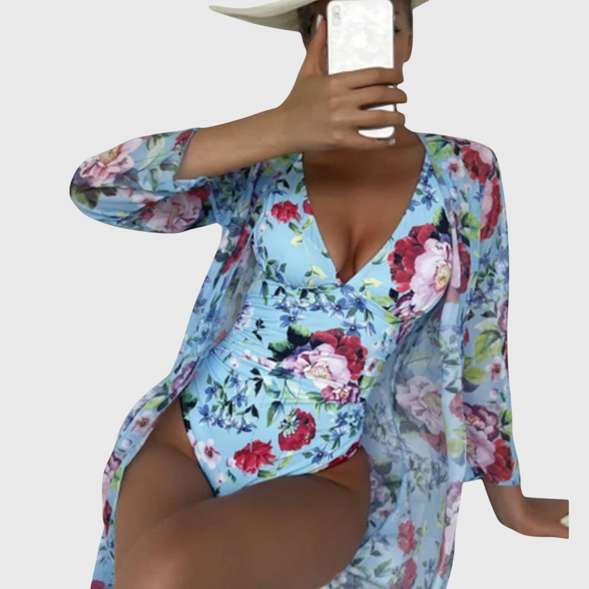 Light blue floral designer swimsuit with long-sleeve wrap showing wrap detail