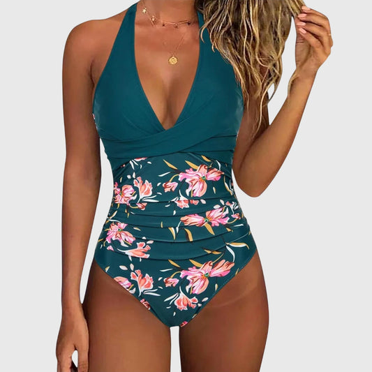Teal v-neck one-piece swimsuit with pink floral print and ruched waist