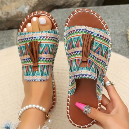 Multicolor geometric platform sandals with green and blue patterns, brown tassel