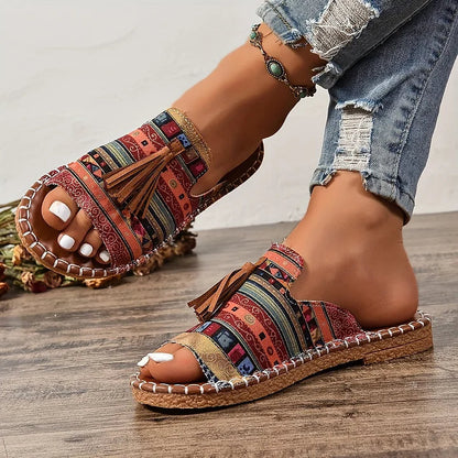 Multicolor striped platform sandals with red accents and brown tassel detail