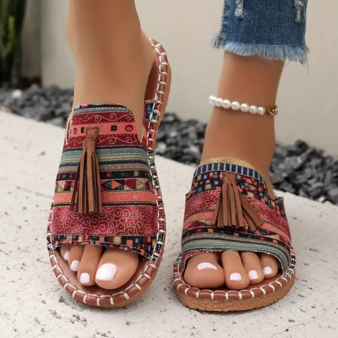 Women platform sandals with red patchwork and brown tassel detail, stitched sole