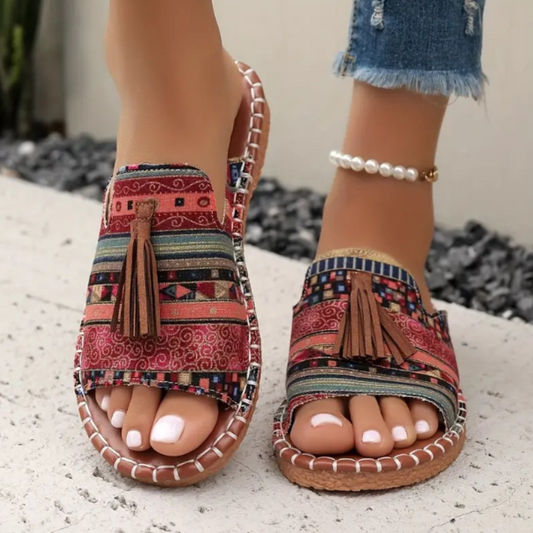 Women platform sandals with red patchwork and brown tassel detail, stitched sole