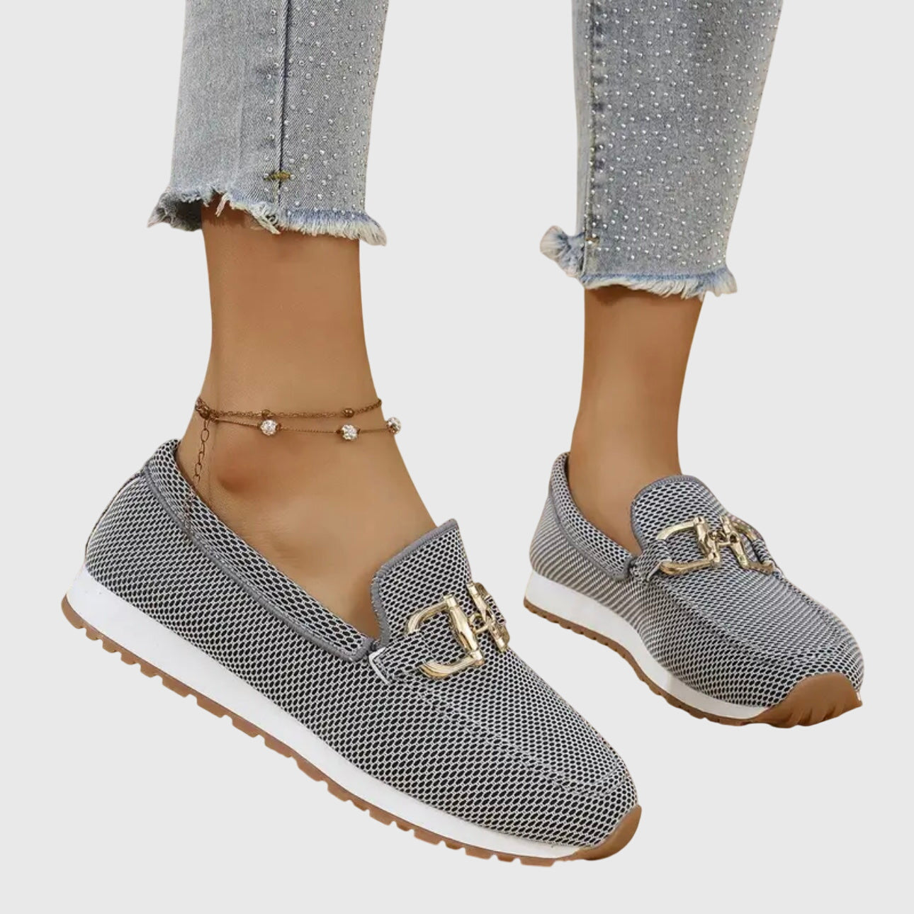 Gray mesh horsebit loafers with white sole and gold bit hardware