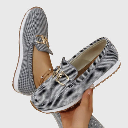 Gray mesh horsebit loafer sole and interior view showing white lining