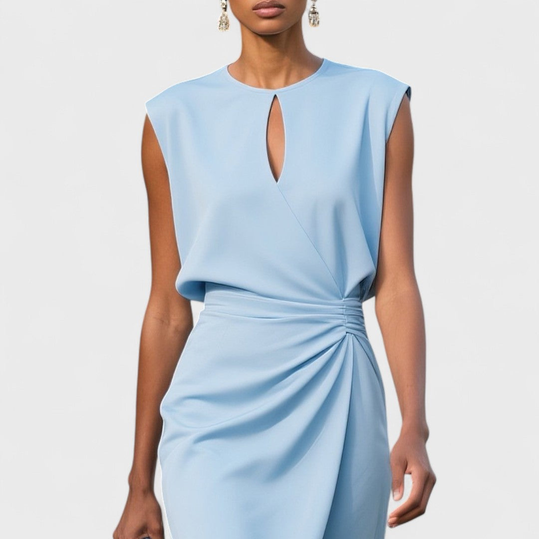 Light blue sleeveless keyhole wrap dress close-up showing ruched waist detail