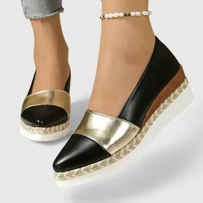 Black and gold metallic espadrille loafers with pointed toe and rope sole