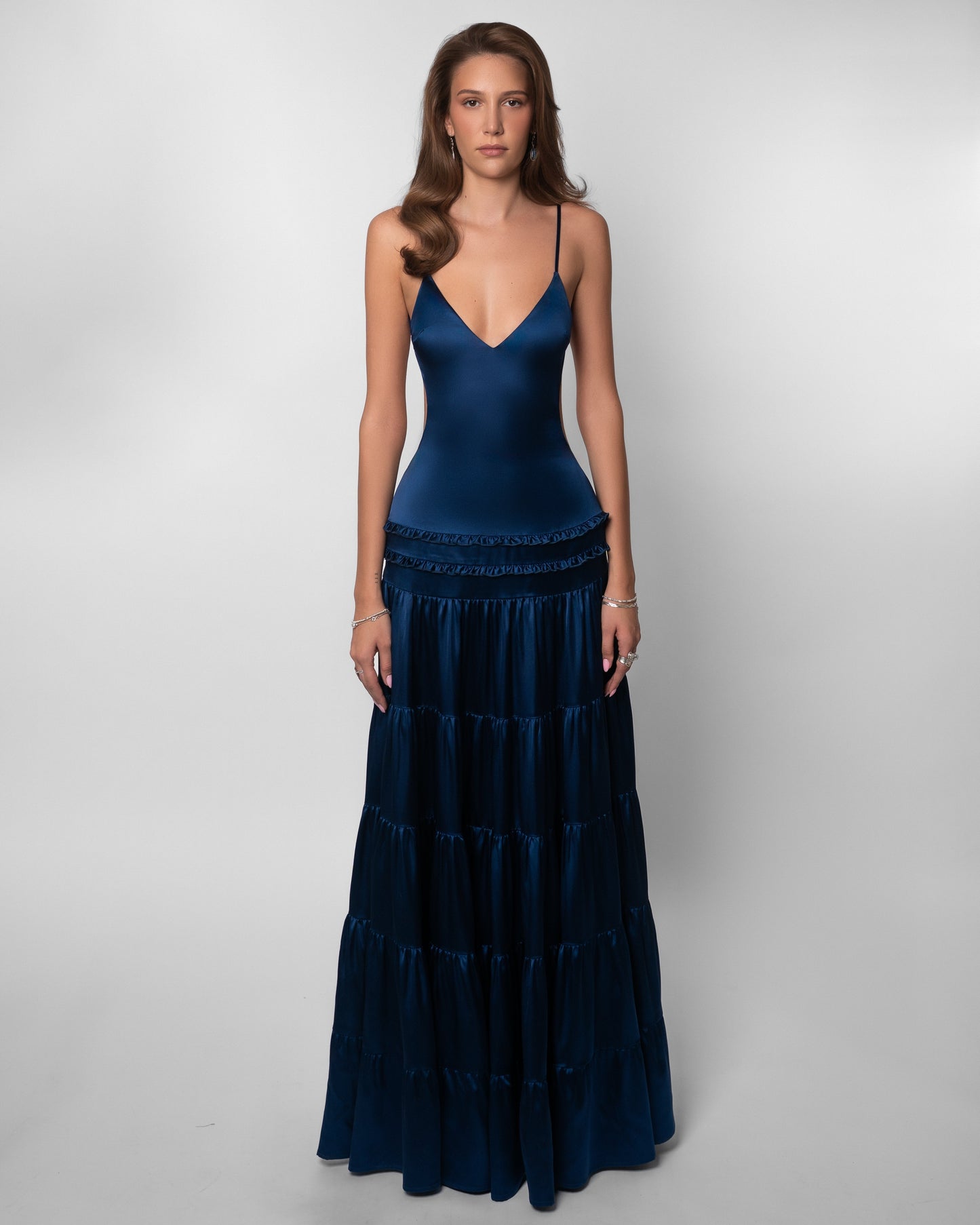 Navy v-neck maxi dress with tiered ruffled skirt and thin straps