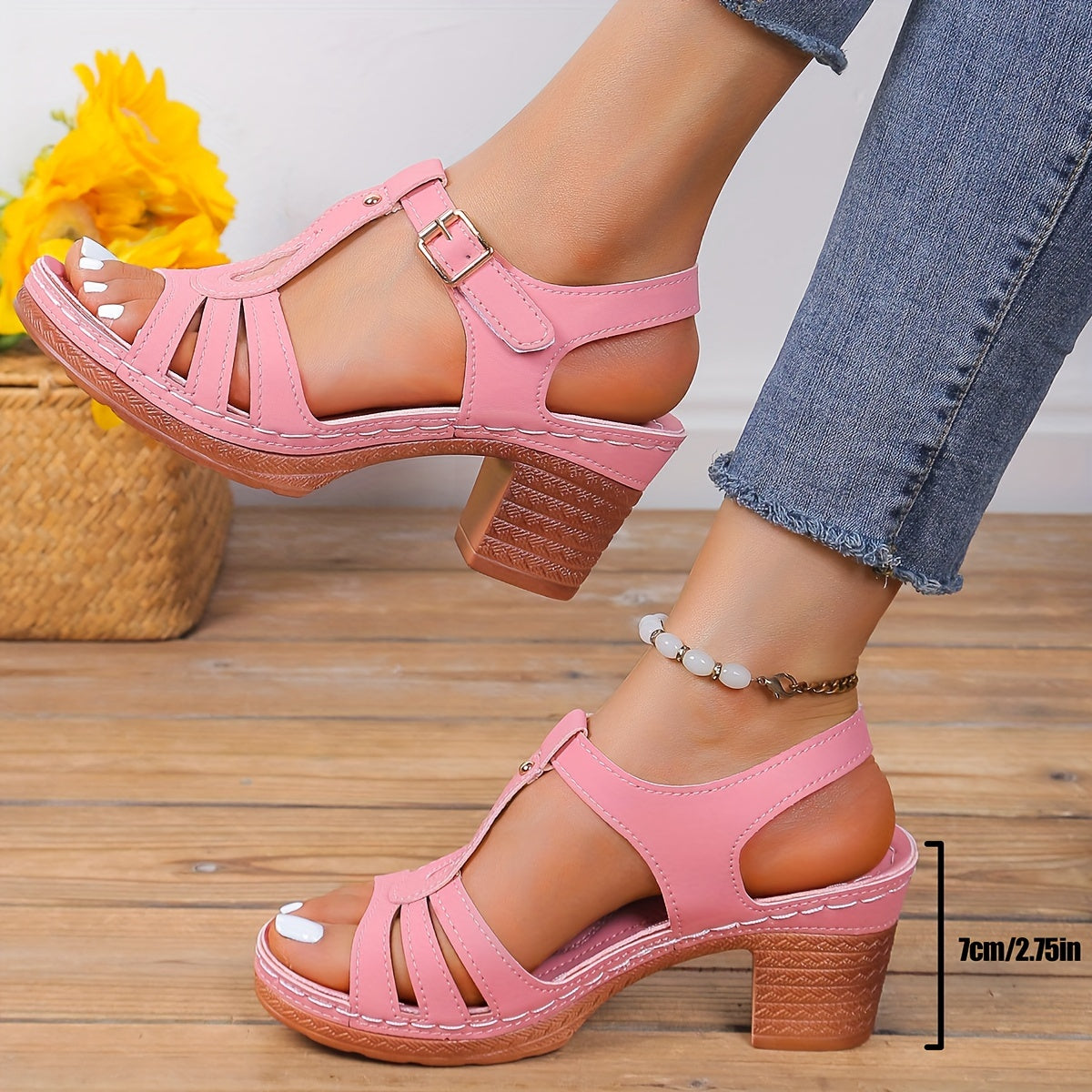 Pink block heel platform t-strap sandal with strappy design and textured sole