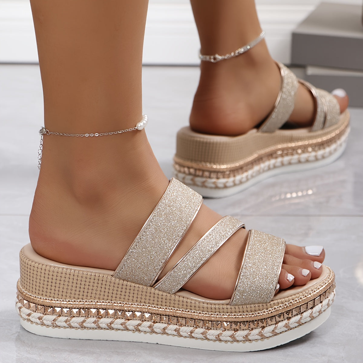 Champagne glitter platform sandal with strappy design and decorative chain ankle bracelet