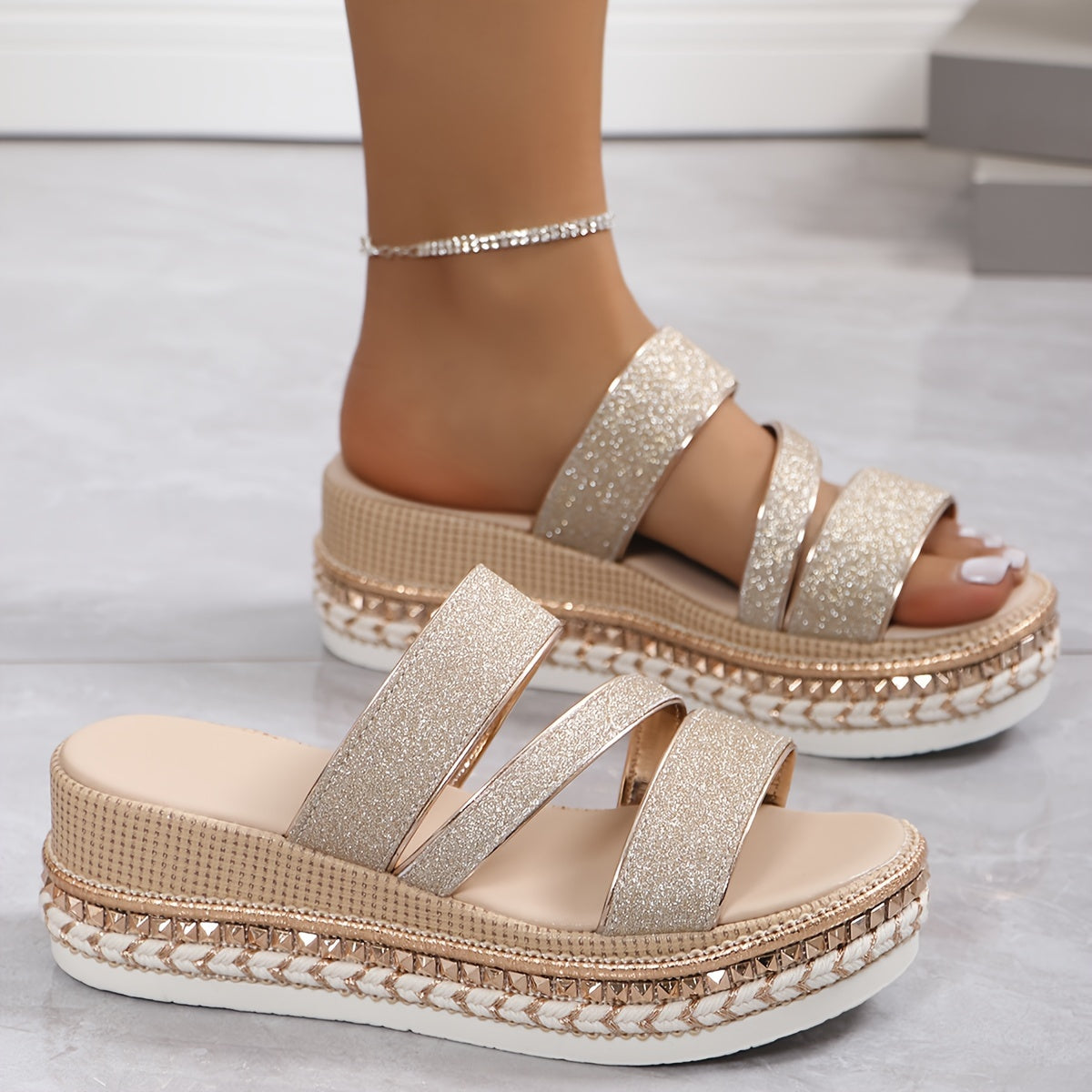 Champagne sparkle platform slide sandals with three glitter straps and woven sole trim