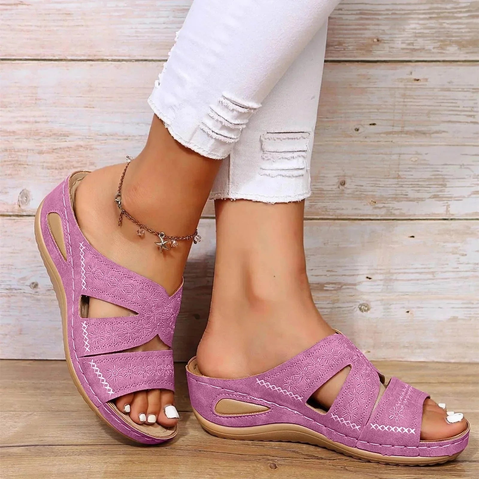 Magenta adjustable wedge platform slide sandals with embroidered pattern and white stitching