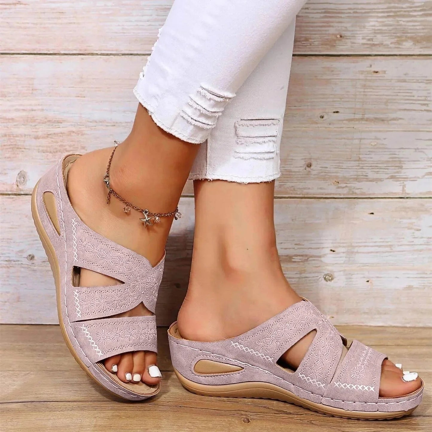Mauve adjustable wedge platform slide sandals with embroidered design and white stitching