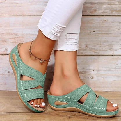 Sage green adjustable wedge platform slide sandals with embroidered straps and white stitching