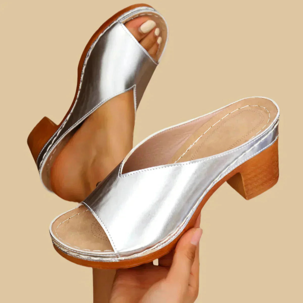 Silver metallic open toe mule with chunky wooden block heel