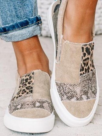 Overhead view of animal print canvas slip-on with leopard and python texture panels