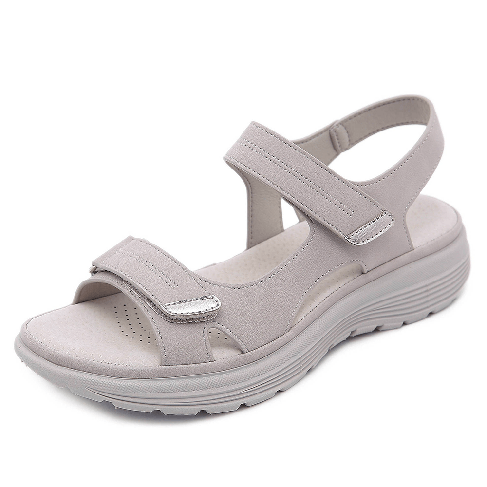 Beige velcro sandal with wide toe box and perforated footbed