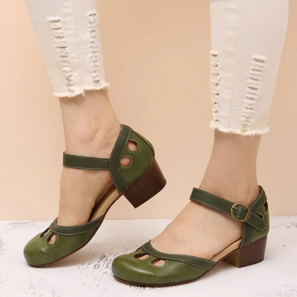 Sage green Mary Jane sandals with rounded toe and adjustable ankle buckle strap