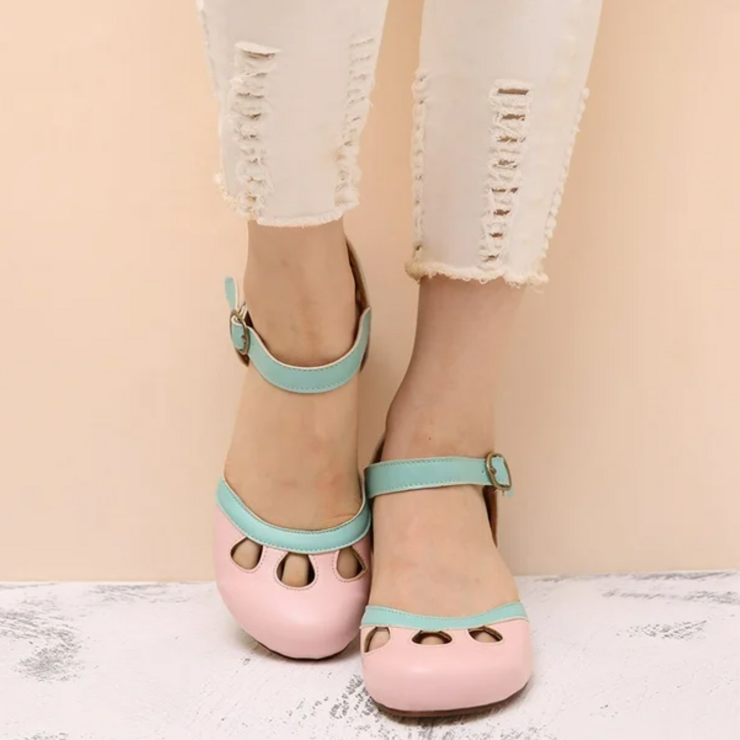 Pink and mint Mary Jane low heel sandals with cutout details and ankle strap
