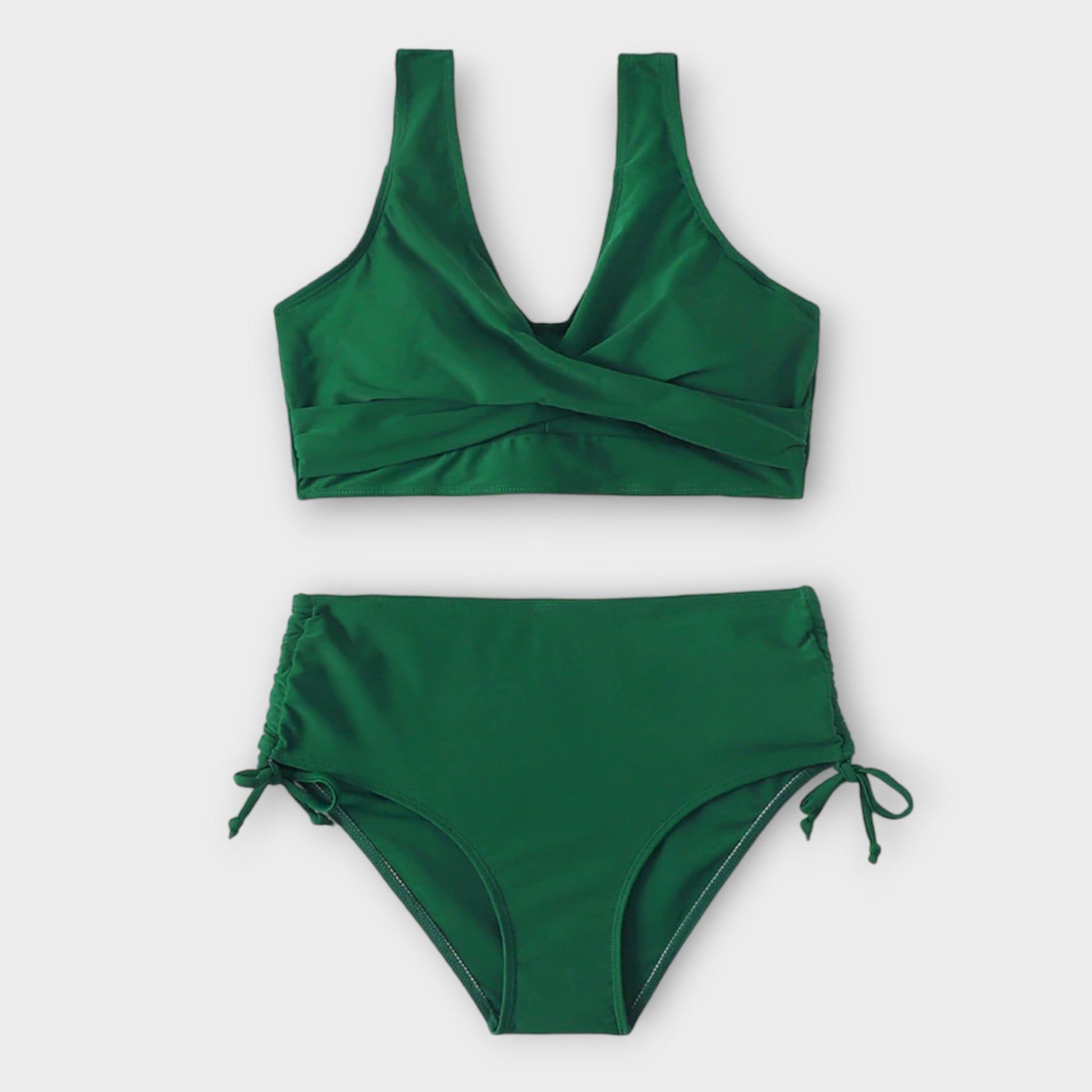 Green wrap crossover bikini with v-neckline top and ruched tie-side bottoms