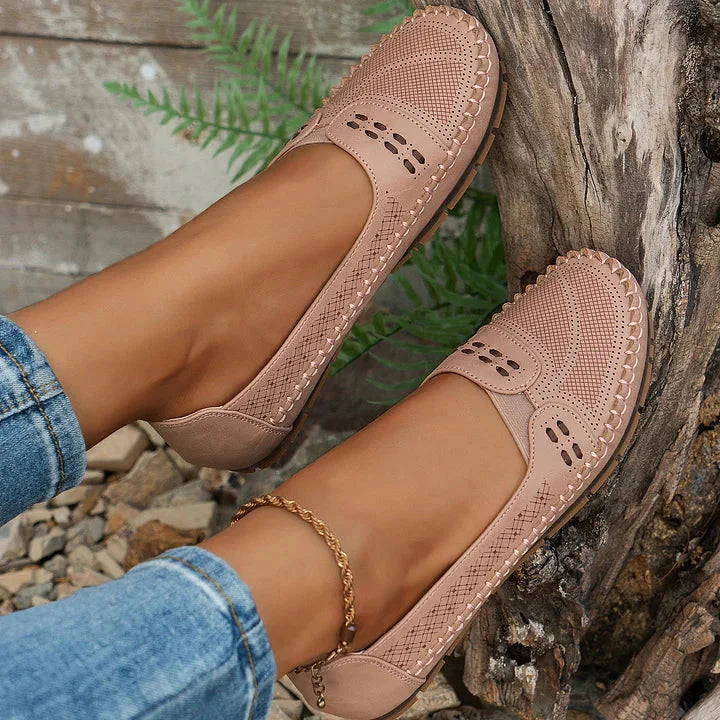 Taupe cushioned loafer flat with perforated mesh upper and textured sole detail