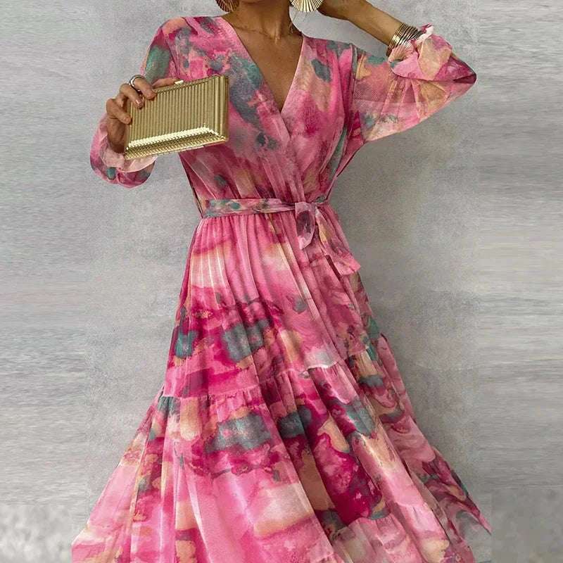 Front view of pink floral v-neck maxi dress with voluminous puffed sleeves