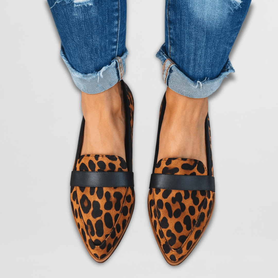 Leopard print suede pointed loafer flats with black band and wooden heel